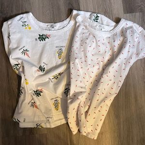 Messy Bun pair of t shirts, red papers and a plant print both on white shirts